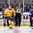 MALMO, SWEDEN - JANUARY 2: Sweden's Filip Forsberg #16 and Slovakia's Milan Kolena #9 skate to their benches after the pre-game gift exchange prior to quarterfinal action at the 2014 IIHF World Junior Championship. (Photo by Andre Ringuette/HHOF-IIHF Images)